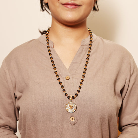 Divine Karungali Malai with Gold Capped Beads & Om Pendant