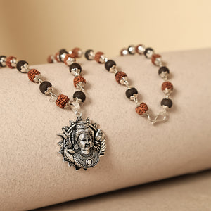 Rudraksha Karungali Malai in Silver-Cap with Lord Murgan Face Pendant 54B