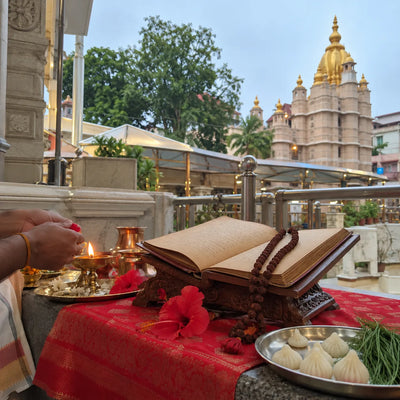 Manuscript, mala, modaks and durva grass for Atharvashirsha recitation