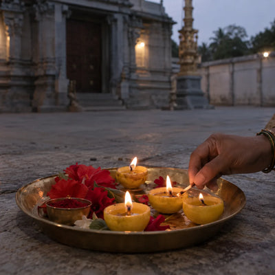 Banashankari Amma Archana: lemon-half lamps lit on a brass tray with kumkum