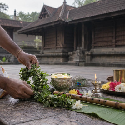 Krishna Seva: a tulasi garland, butter, a flute and a peacock feather for a Krishna seva