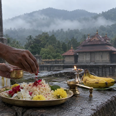 Kumkumarchana: kumkum on a plate of rice with a ladle for Annapoorneshwari