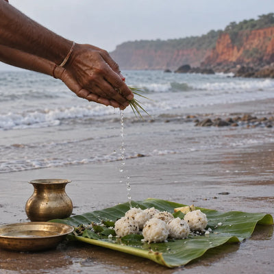 Pitru Tarpanam at Papanasam: tarpanam on the beach below laterite cliffs