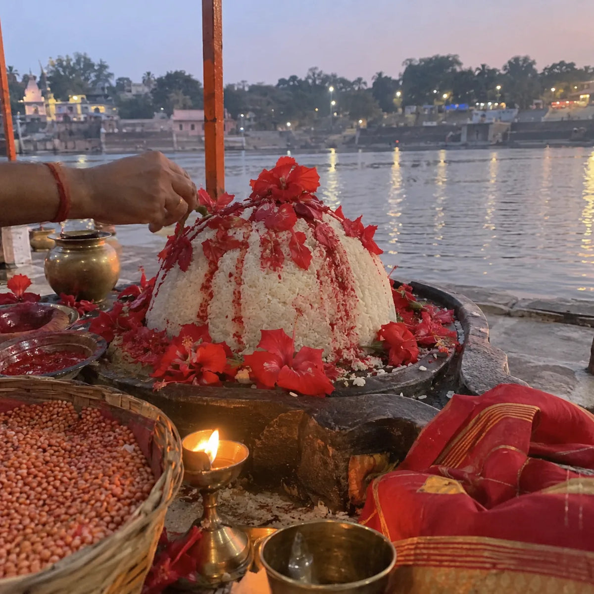 Shivling covered with cooked rice and red flowers for Mangal bhat puja