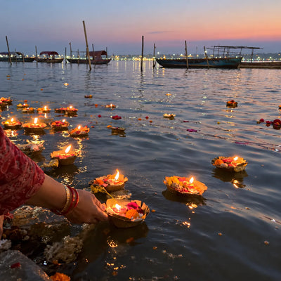 Lamps in leaf cups floating on the river at dusk for deep daan