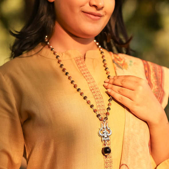 Rudraksha Karungali Malai in Silver-Cap with Om Shiva Trishul with Larger Bead Lifestyle Female