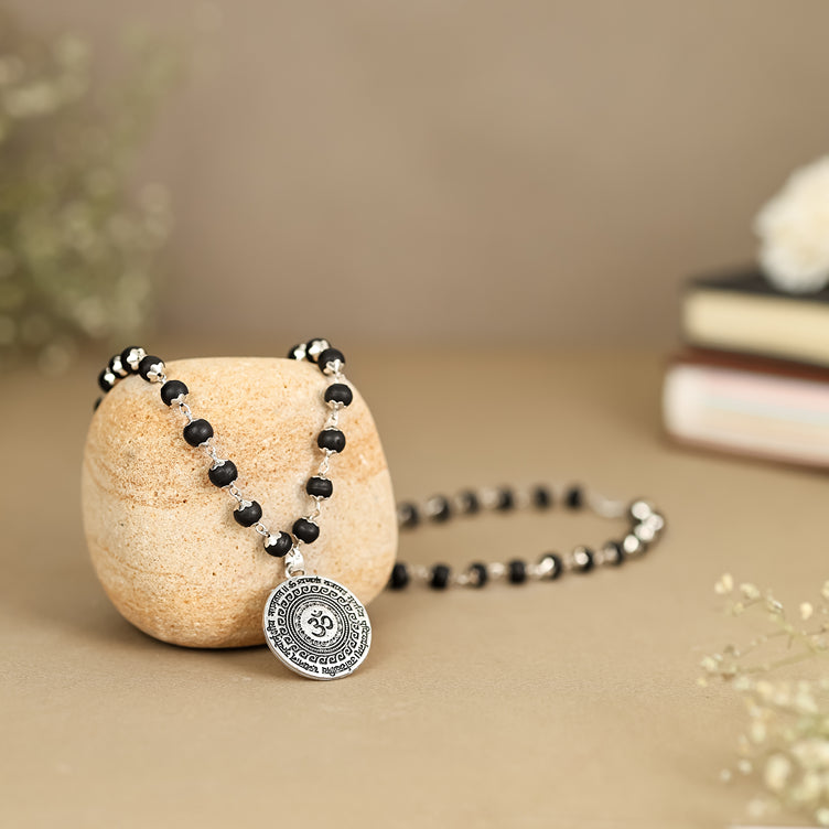 Karungali Malai with Silver-Plated Caps & Oxidized Om Pendant