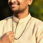 Black Rudraksha Necklace with Silver Cap