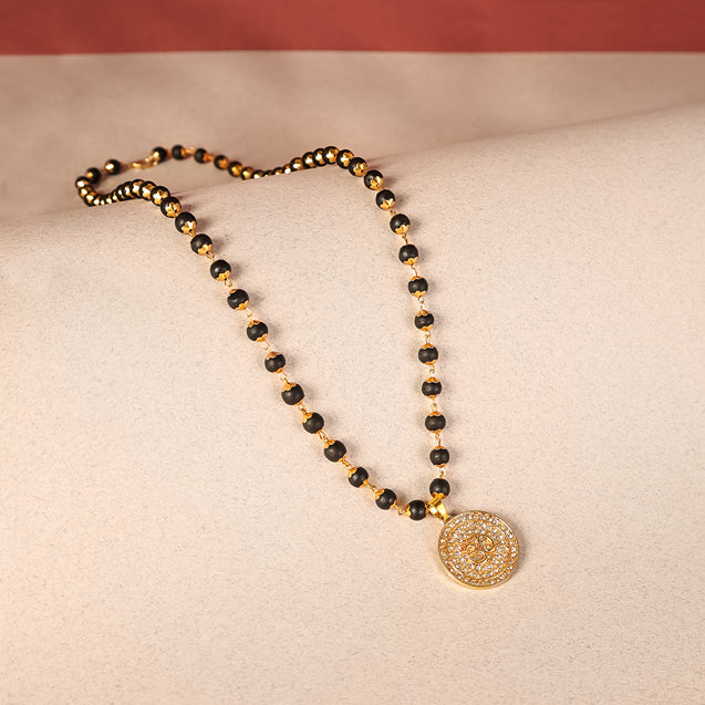 Divine Karungali Malai with Gold Capped Beads & Om Pendant