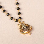 Divine Karungali Malai with Gold Capped Beads & Shiv Trishul Pendant Closeup