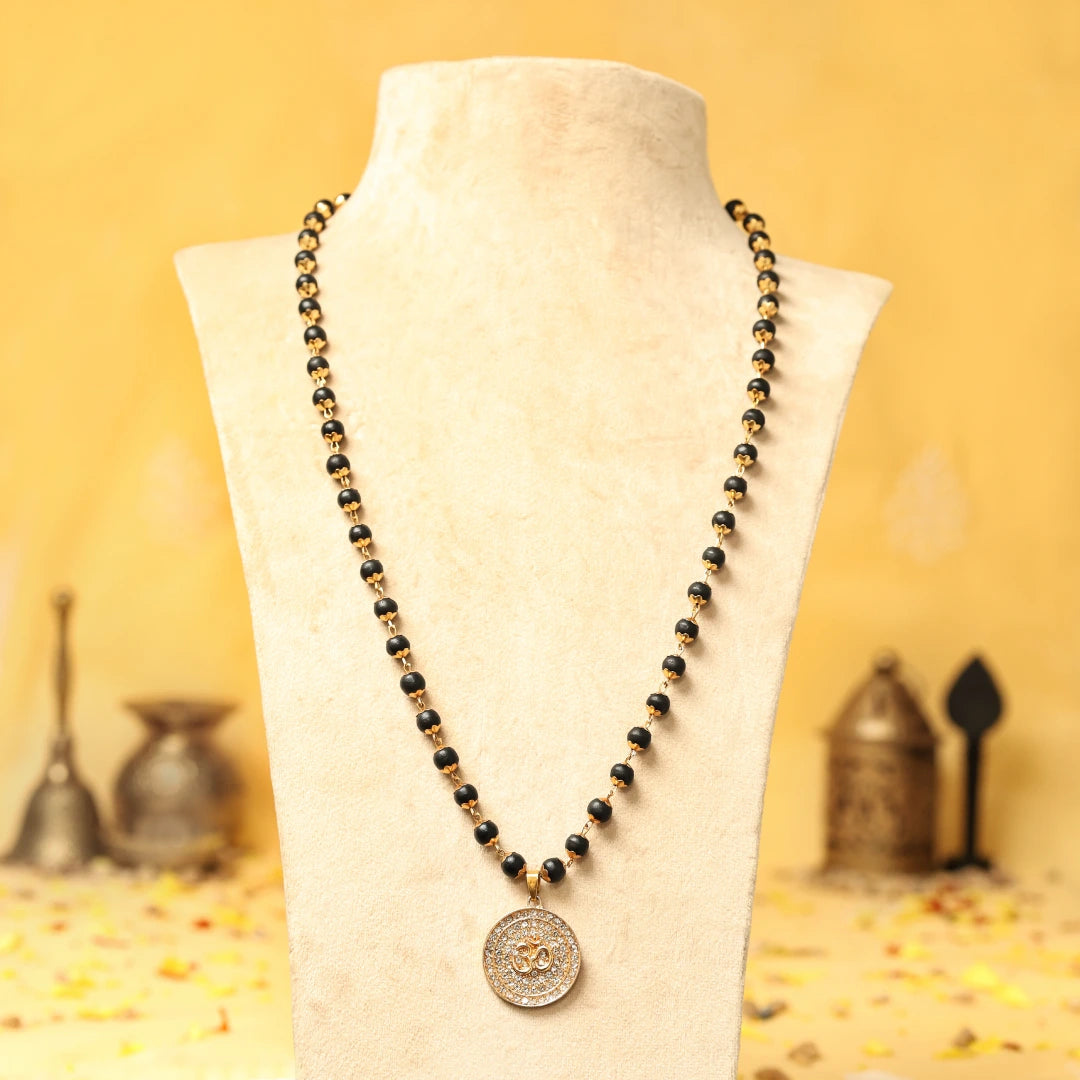 Divine Karungali Malai with Gold Capped Beads & Om Pendant