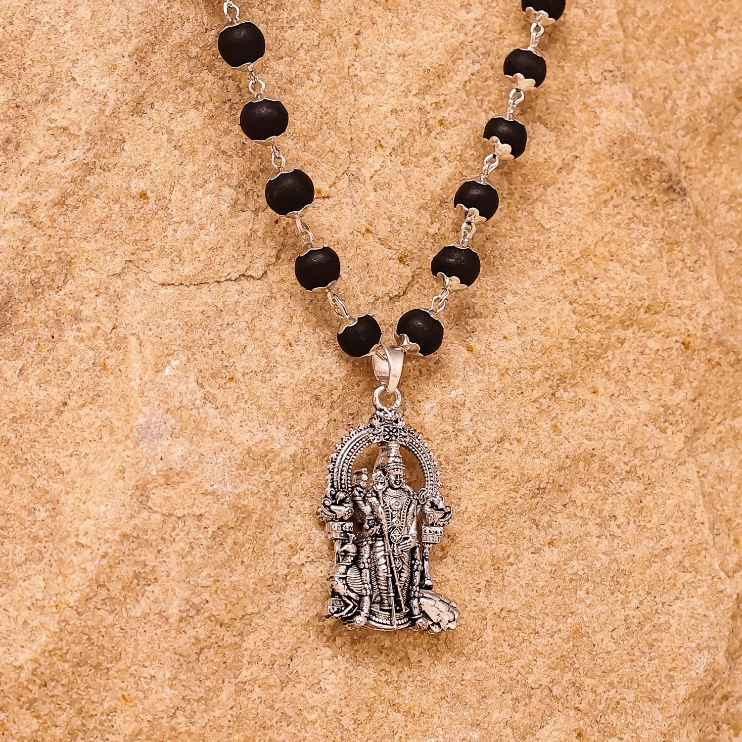 Silver Capped Lord Murugan Pendant Benefits

Brings the grace of Lord Murugan for good health, success, and protection.

Enhances one's inner peace and self-confidence, fostering spiritual development.

Manufactured from high-quality silver, which helps retain its polish and ensures durability.
