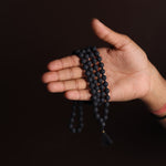 Lava Stone 108 Beads Jaap Mala held in hand