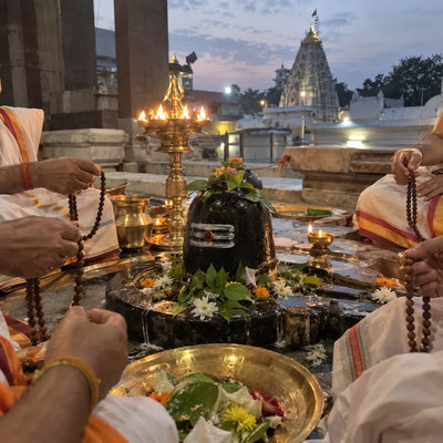 Rudraksha malas in a circle around a Shivling for Mahamrityunjaya jaap