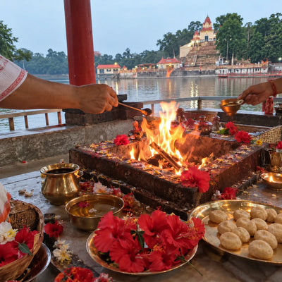 Havan fire with red hibiscus and pedas