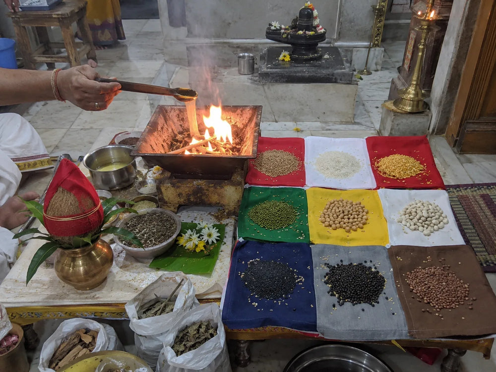 Navgraha Shanti Puja: Navagraha havan with nine grains on cloths in the nine graha colours