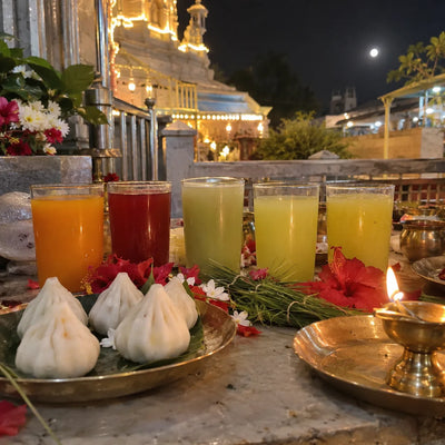 Five fruit juices, modaks and durva grass for the Sankashti Chaturthi abhishek